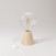 Table lamp with alder base and transparent light bulb