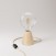 Table lamp with alder base and transparent light bulb